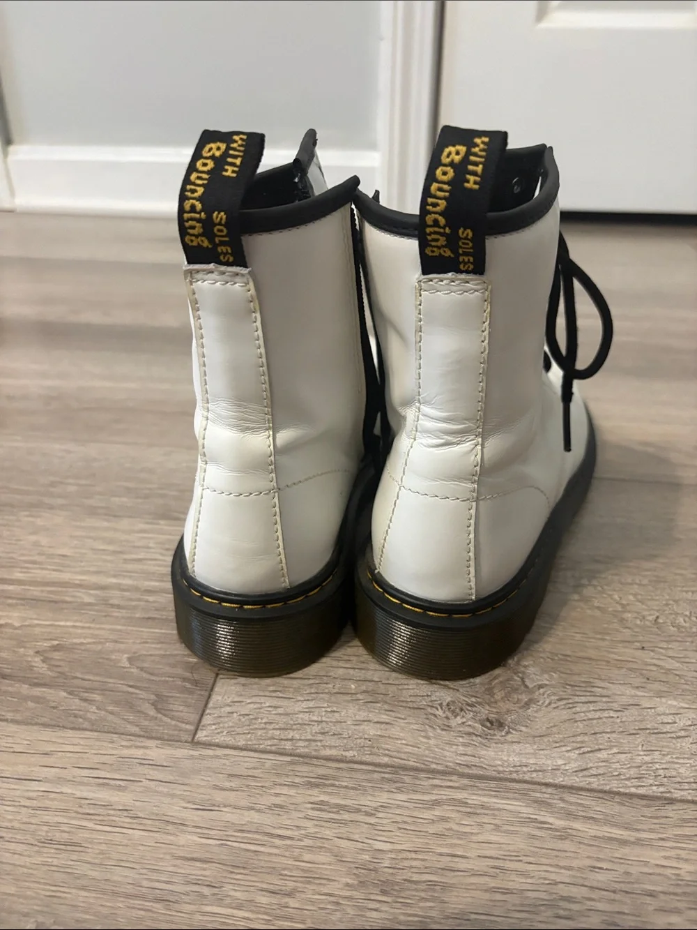 Dr. Martens White Leather Lace-Up Boots with Black Laces